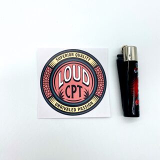 LOUDcpt Logo Sticker Coral with Clipper Lighter for scale
