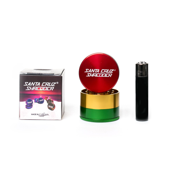 Santa Cruz Shredder 3-Piece Medium - Rasta With Clipper Lighter For Scale