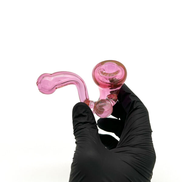 Hand holding Praxis Glass One Piece Sherlock Pipe in Hot Pink
