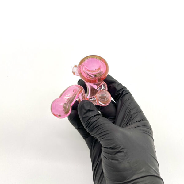 Hand holding Praxis Glass One Piece Sherlock Pipe in Hot Pink