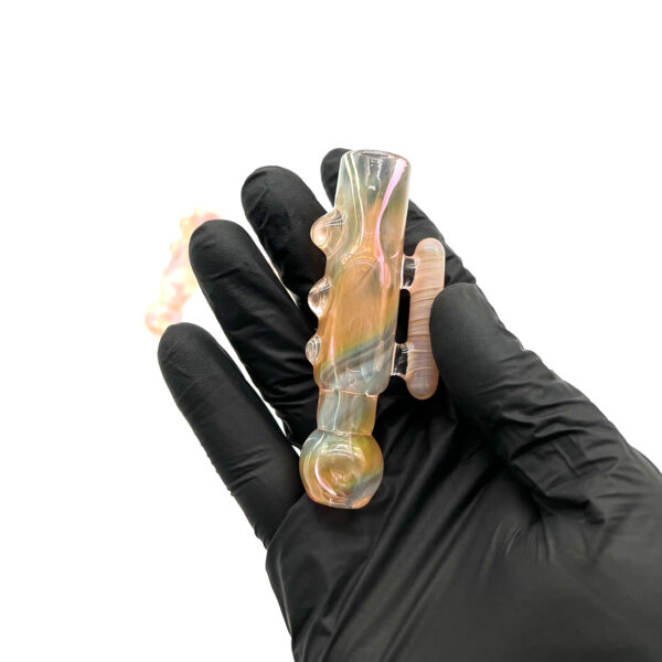 Hand holding Praxis Glass One Hitter Voyager 2.0 pipe With Handle